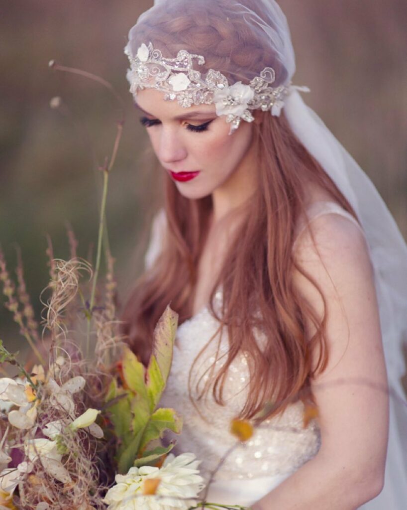 braided with veil hair down pretty wedding hairstyle