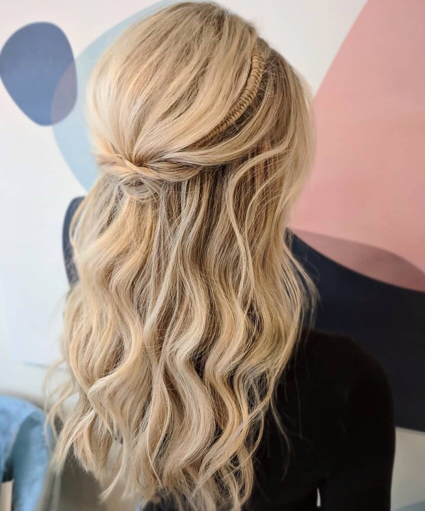 cute half up half down bridesmaid hairstyle with infinity braid accent