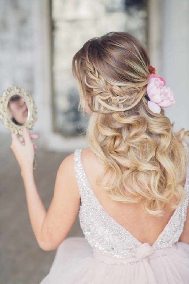 frill bread half up half down wedding hairstyle with pink flower