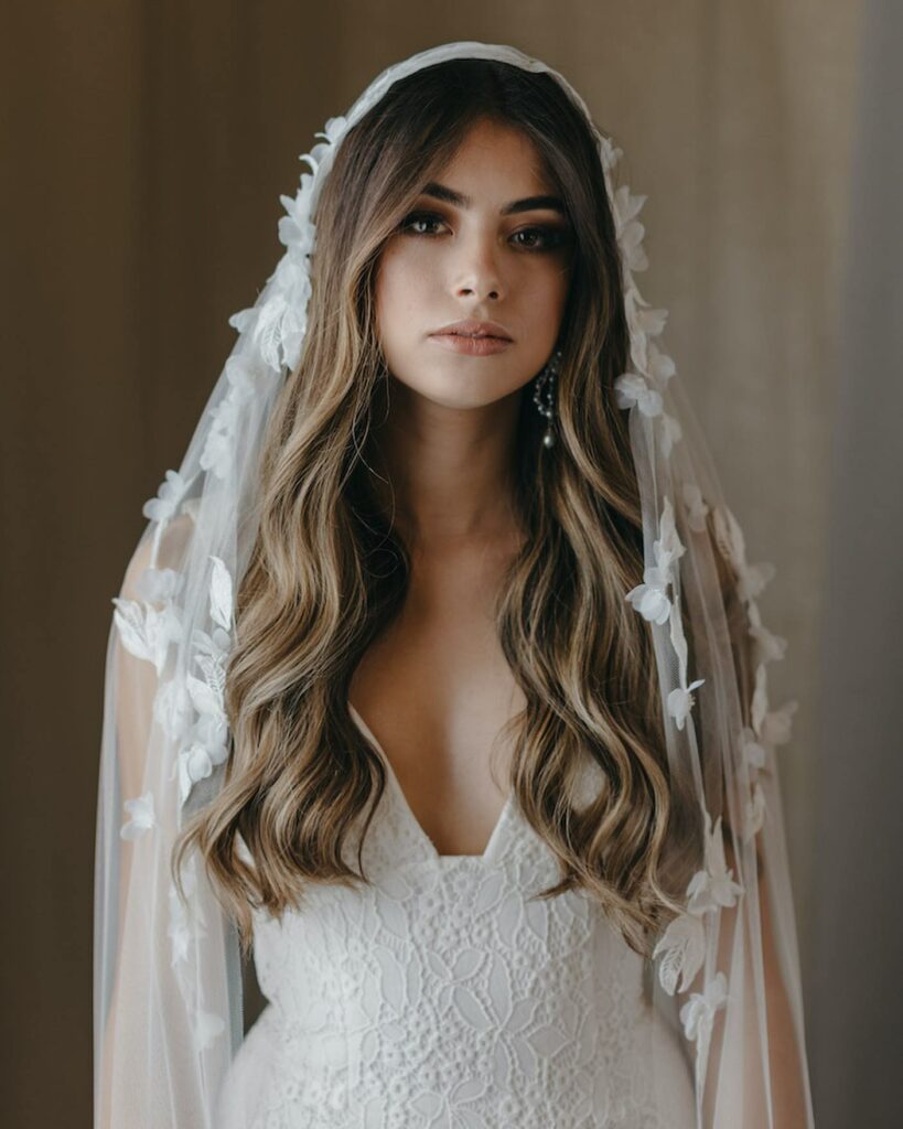 hair down wedding hairstyle with lace and floral detail veil