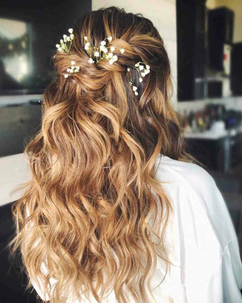half up half down wedding hairstyle with twisted flair