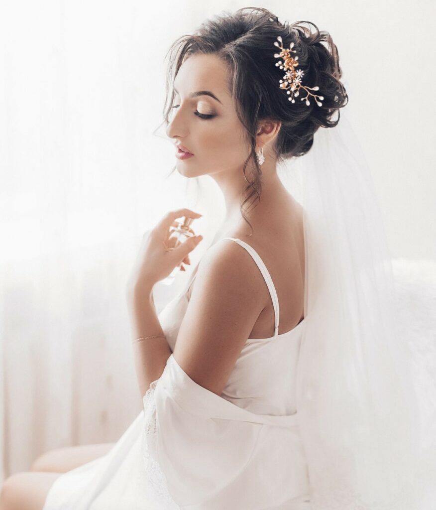 high updo wedding hairstyle with small hair comb and veil