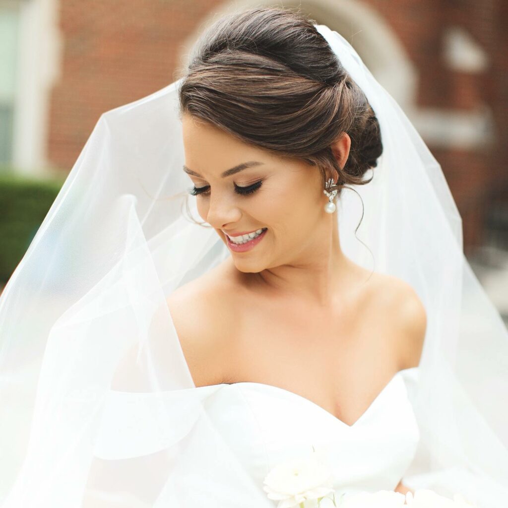 long updo style wedding hairstyle with veil