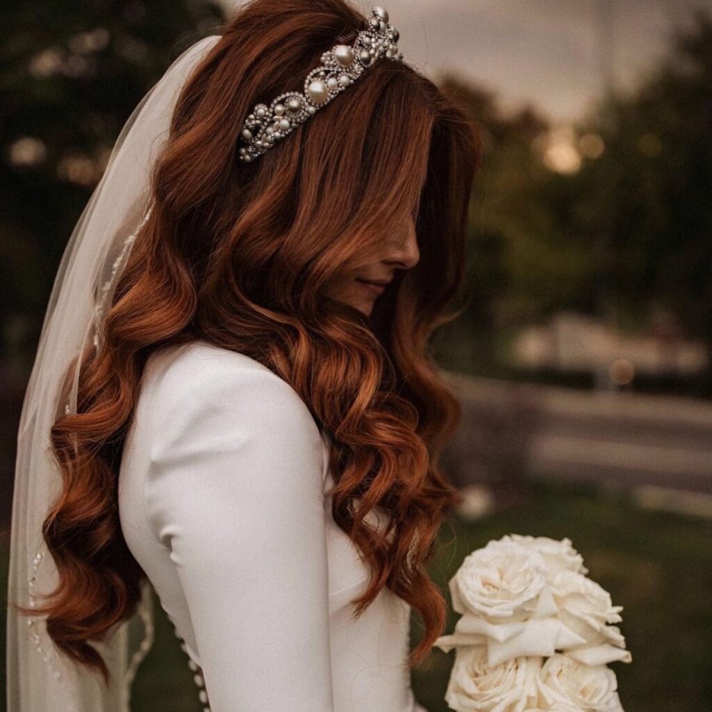red hair down wedding hairstyle with pearl crown and veil