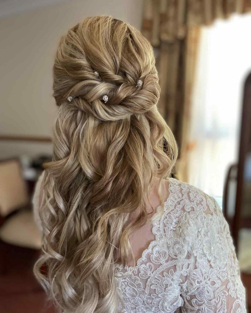twisted with loose curls half up and half down boho wedding hairstyle