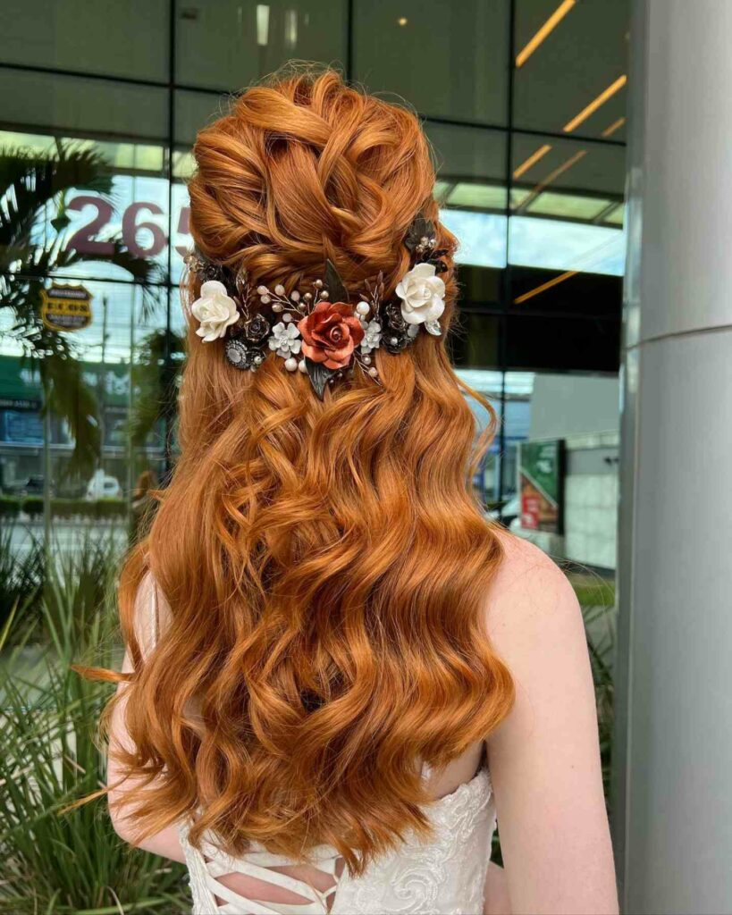vibrant half updo bridal hairstyle with floral