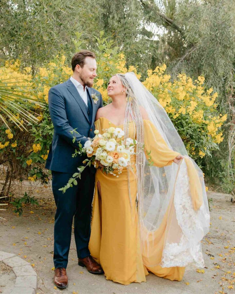 vibrant yellow bridal dress with veil