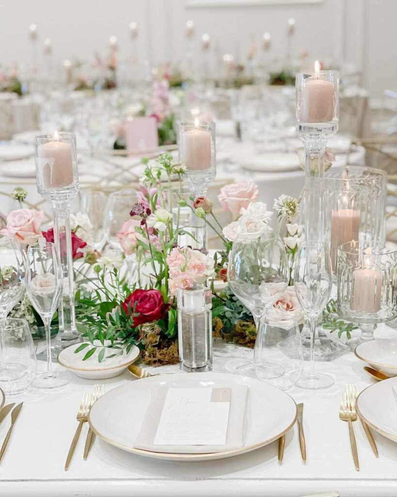 blush and white wedding centerpiece with pillar candles
