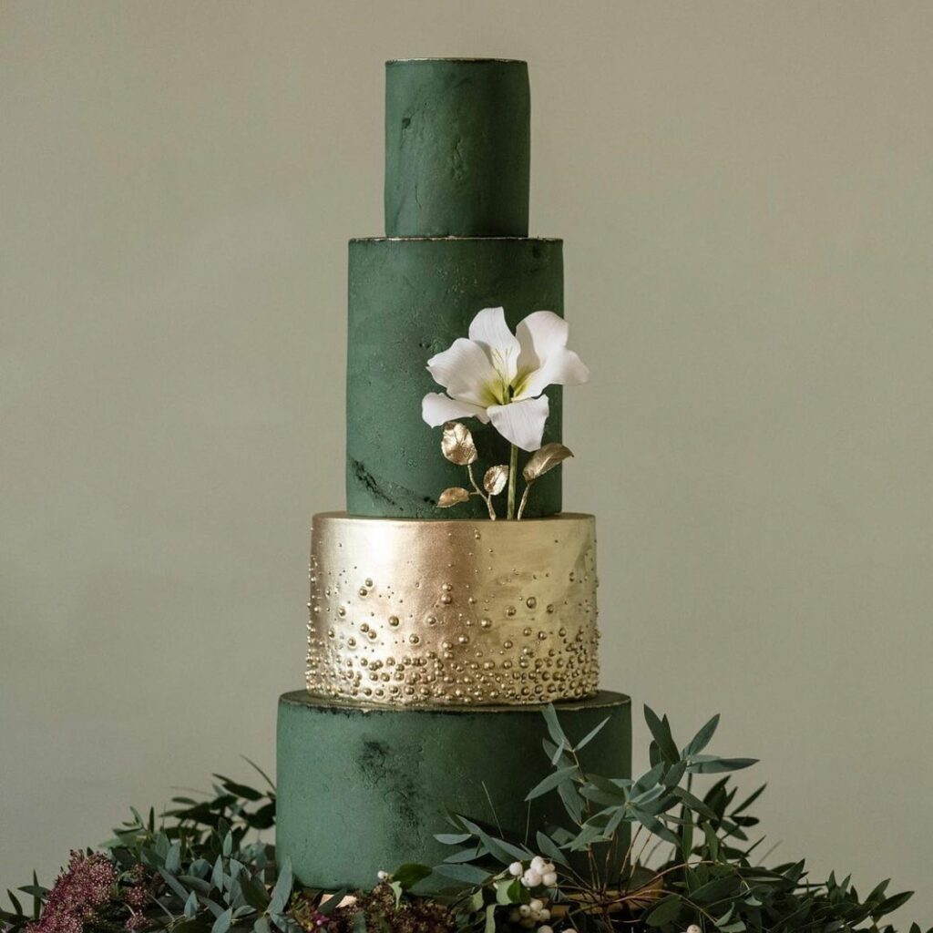 deep emerald green and gold winter wedding cake