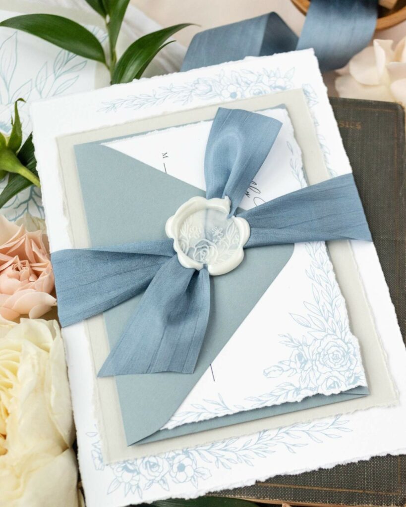 duty blue place wedding cards with bow