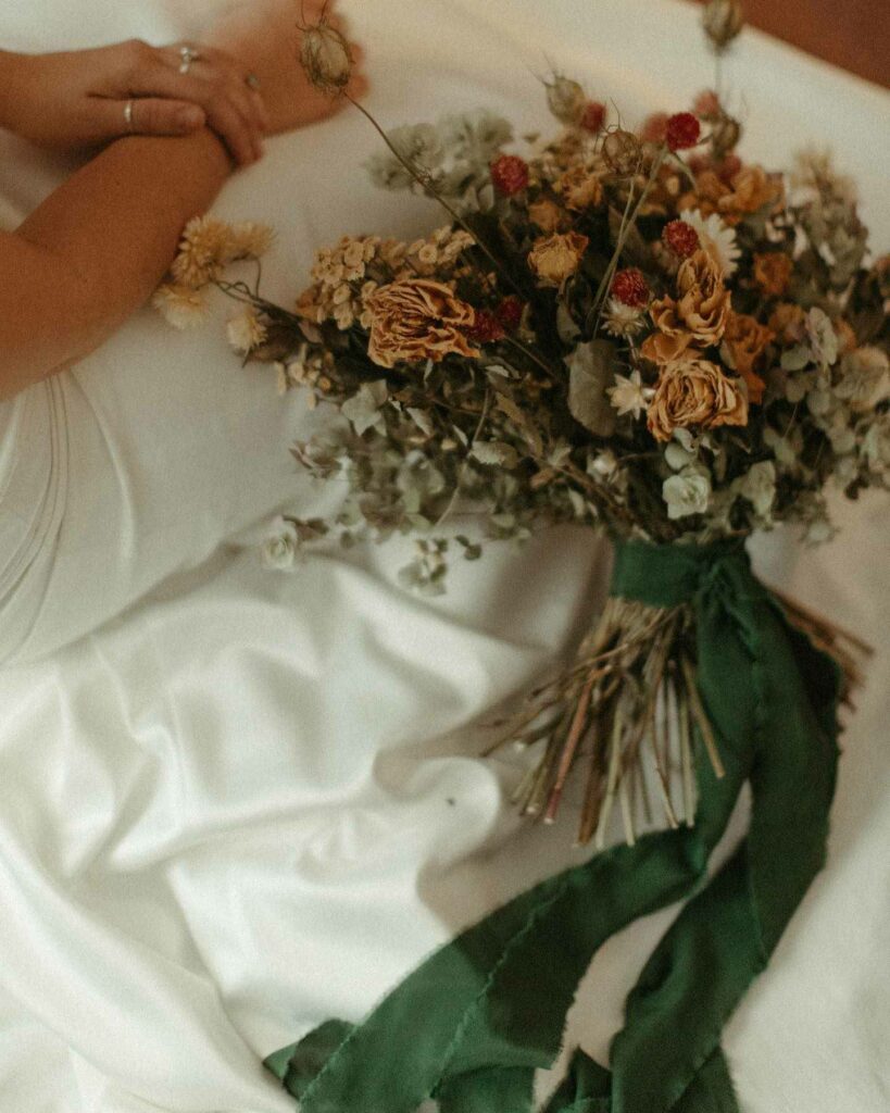 emerald and gold dried rustic wedding bouquet