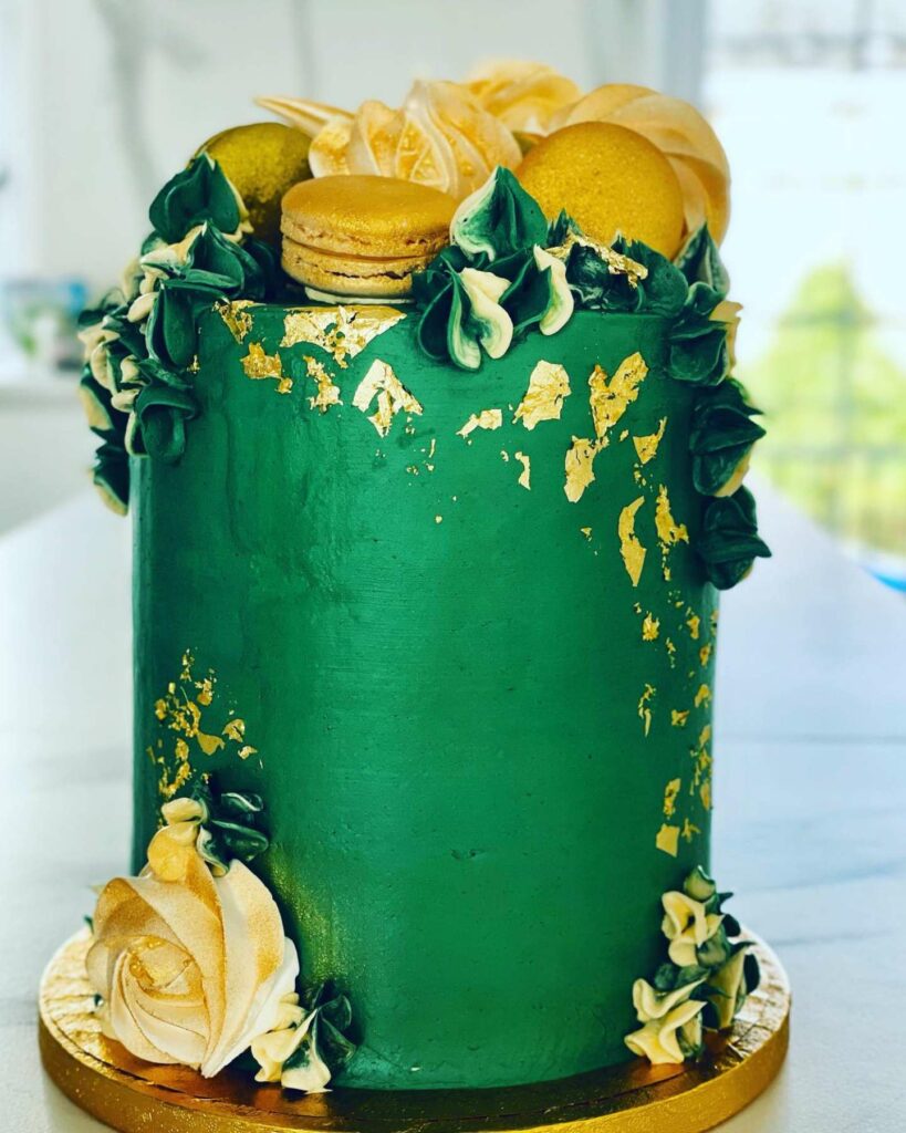 emerald green and gold adorned with macaron wedding cake