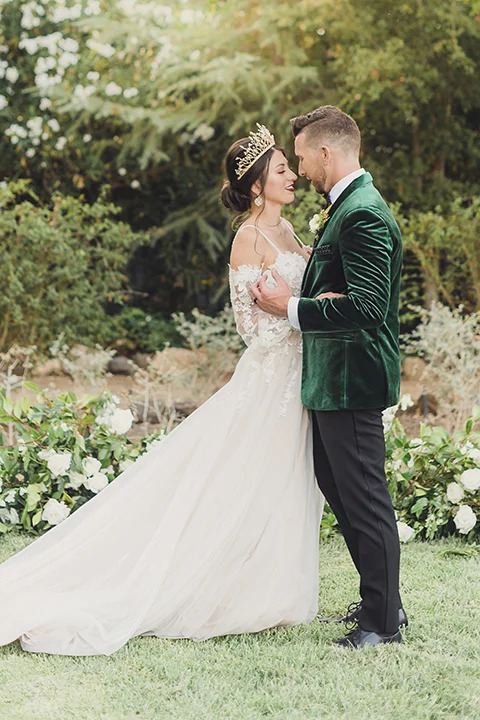 emerald green and gold groom suit gold with lace bridal dress