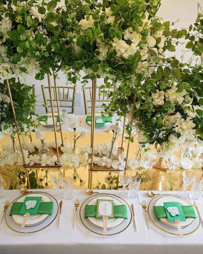 emerald green and gold tall centerpiece wedding reception decor