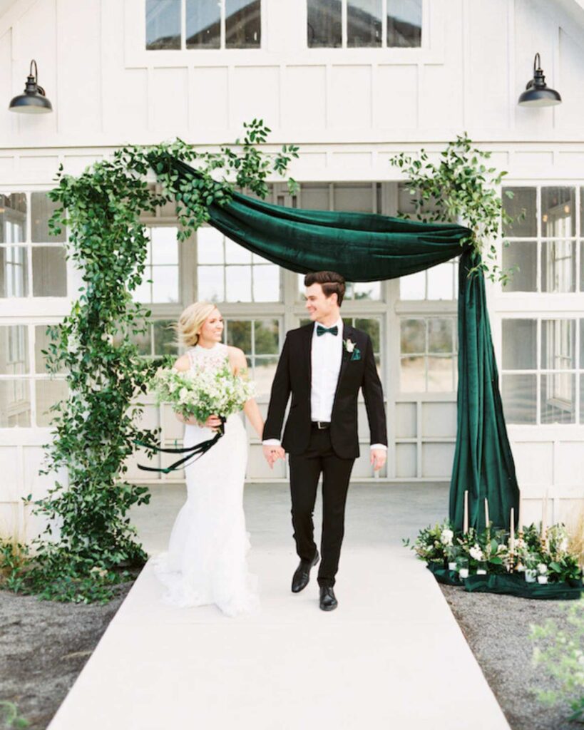 emerald green and gold wedding background with candles