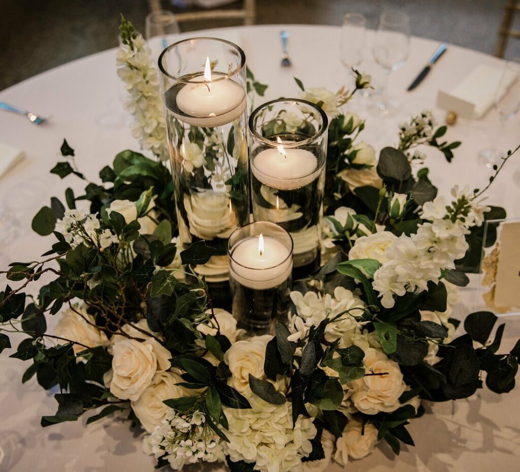 floral wreath and floating candle wedding centerpiece