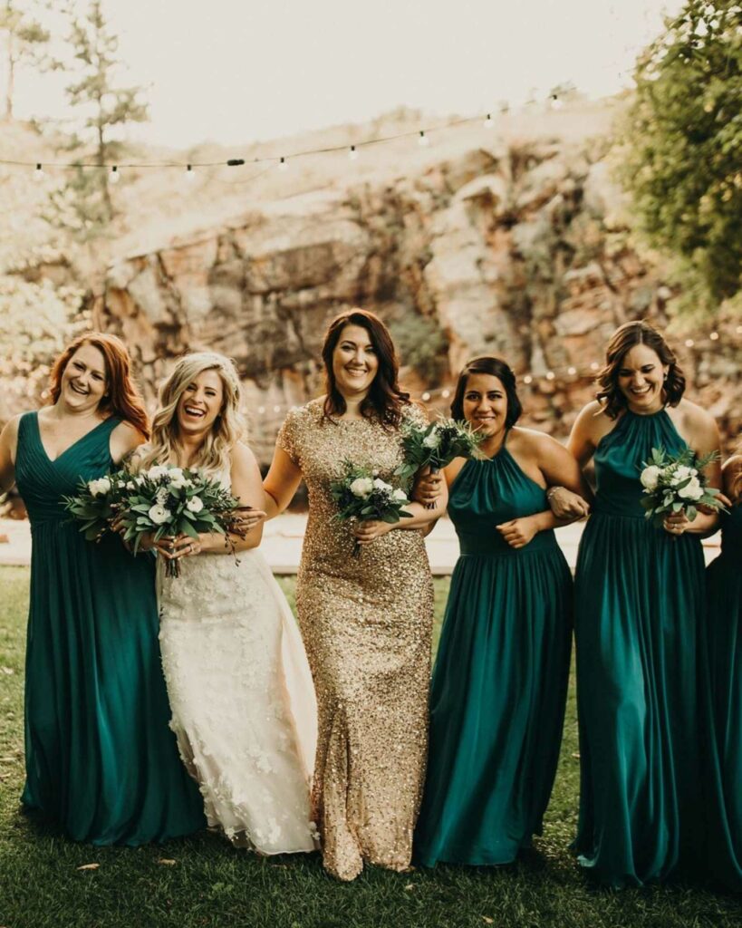 green and gold bridesmaid wedding dresses with greenery bouquet