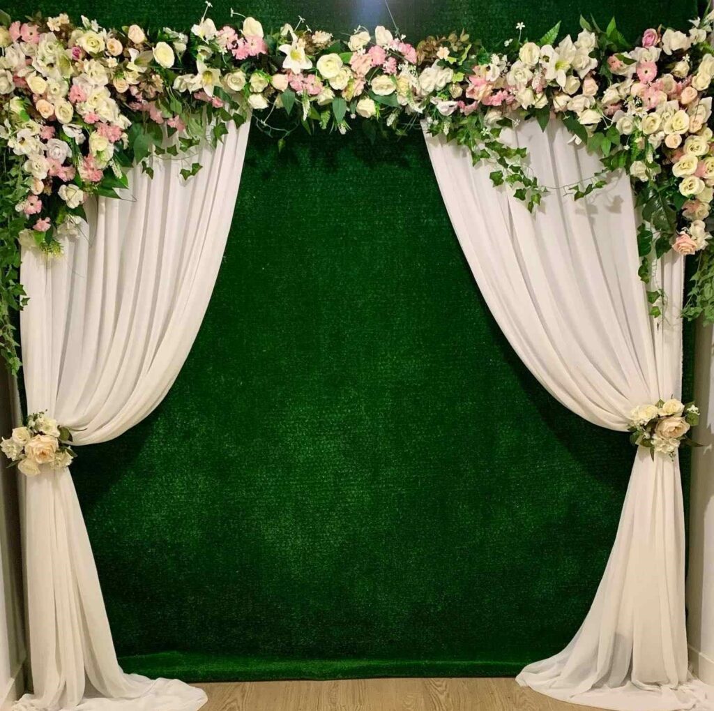 green and gold with dusky pink wedding ceremony backdrop