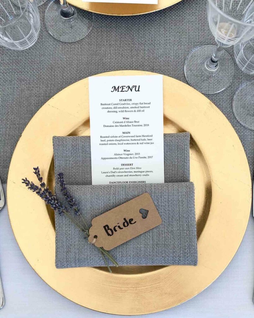 grey and gold menu wedding colors with glassware