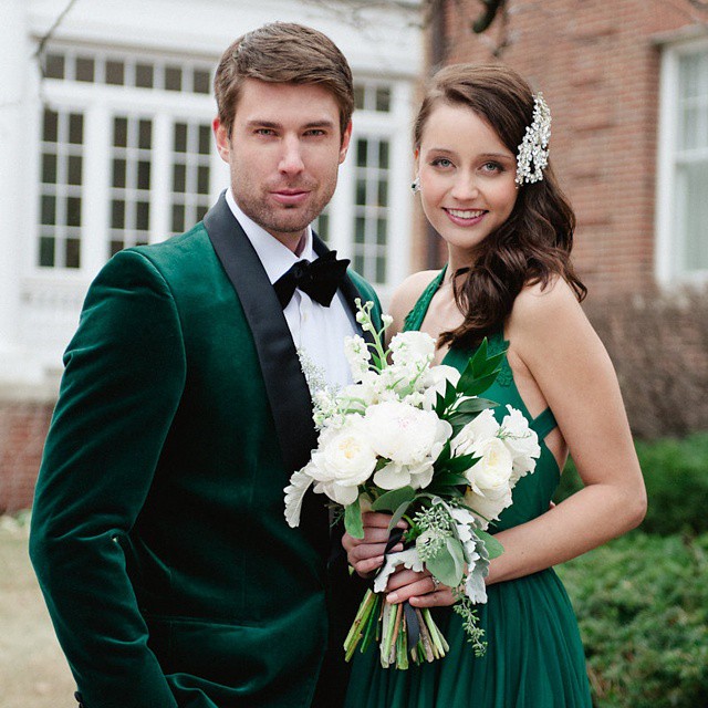 groom and bride emerald green wedding dress with bouquet