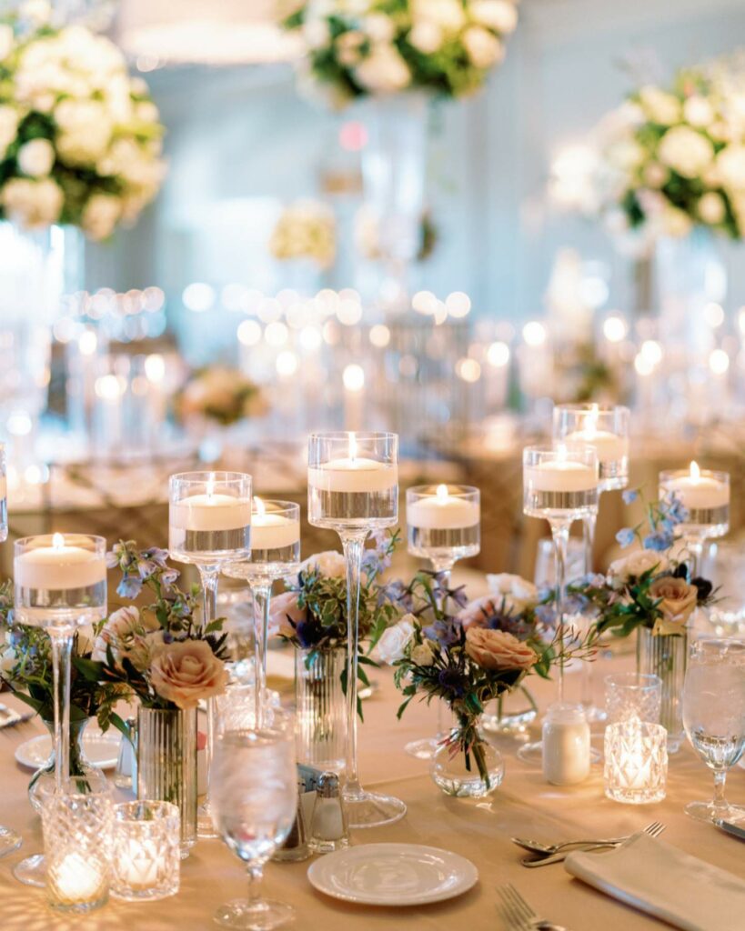 long wedding centerpiece table decoration with floating and votive candles