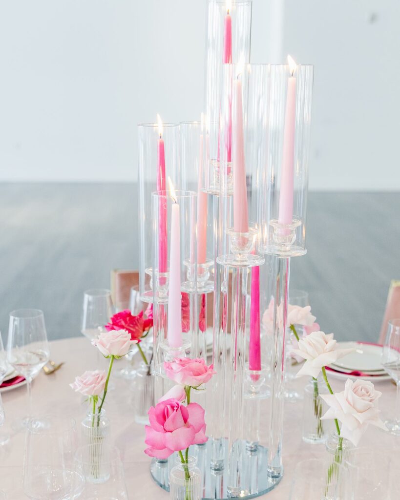 modern and chic wedding table centerpiece with blush pink taper candles