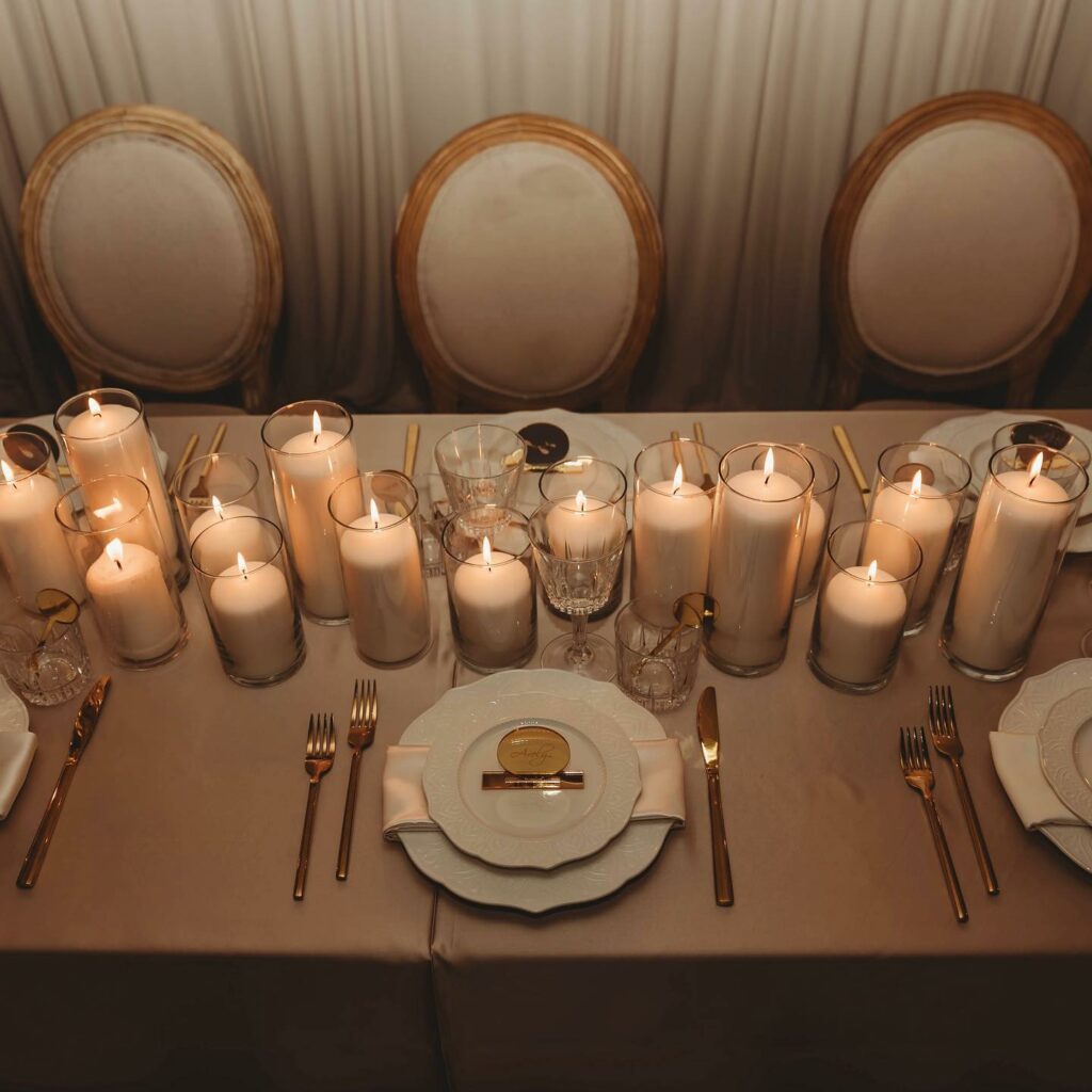 pillar candle wedding centerpiece with simple table setting