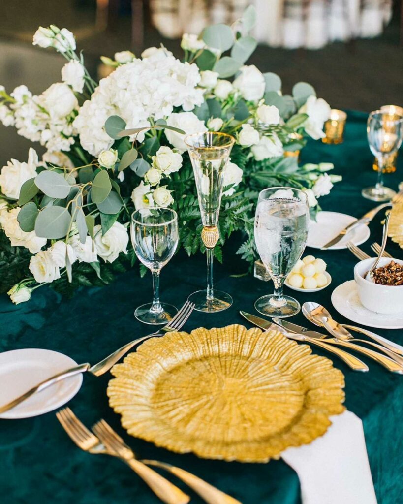 rich emerald green and warm gold create a luxurious wedding color palette