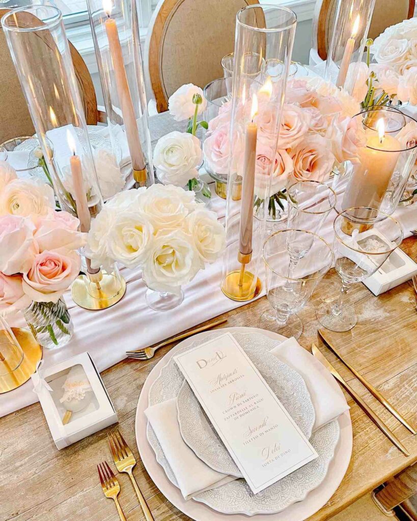 taper candle wedding centerpiece with blush and gold details
