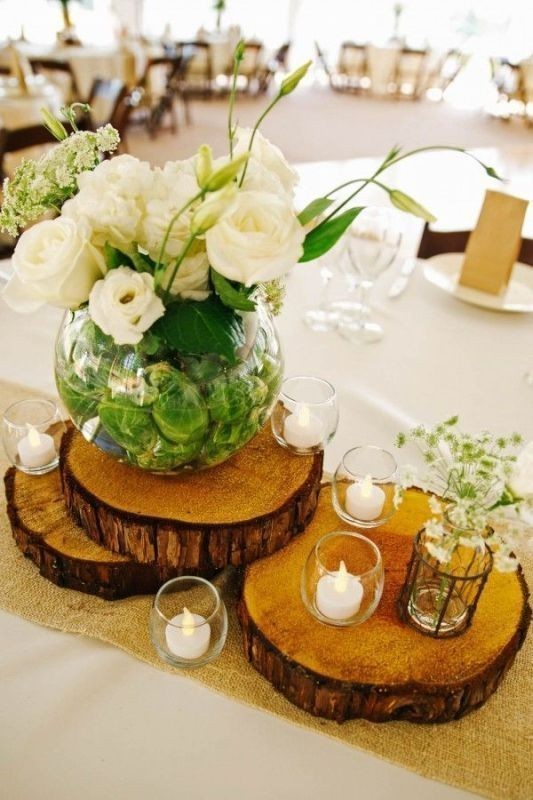 tea light rustic wedding centerpiece with wooden stump