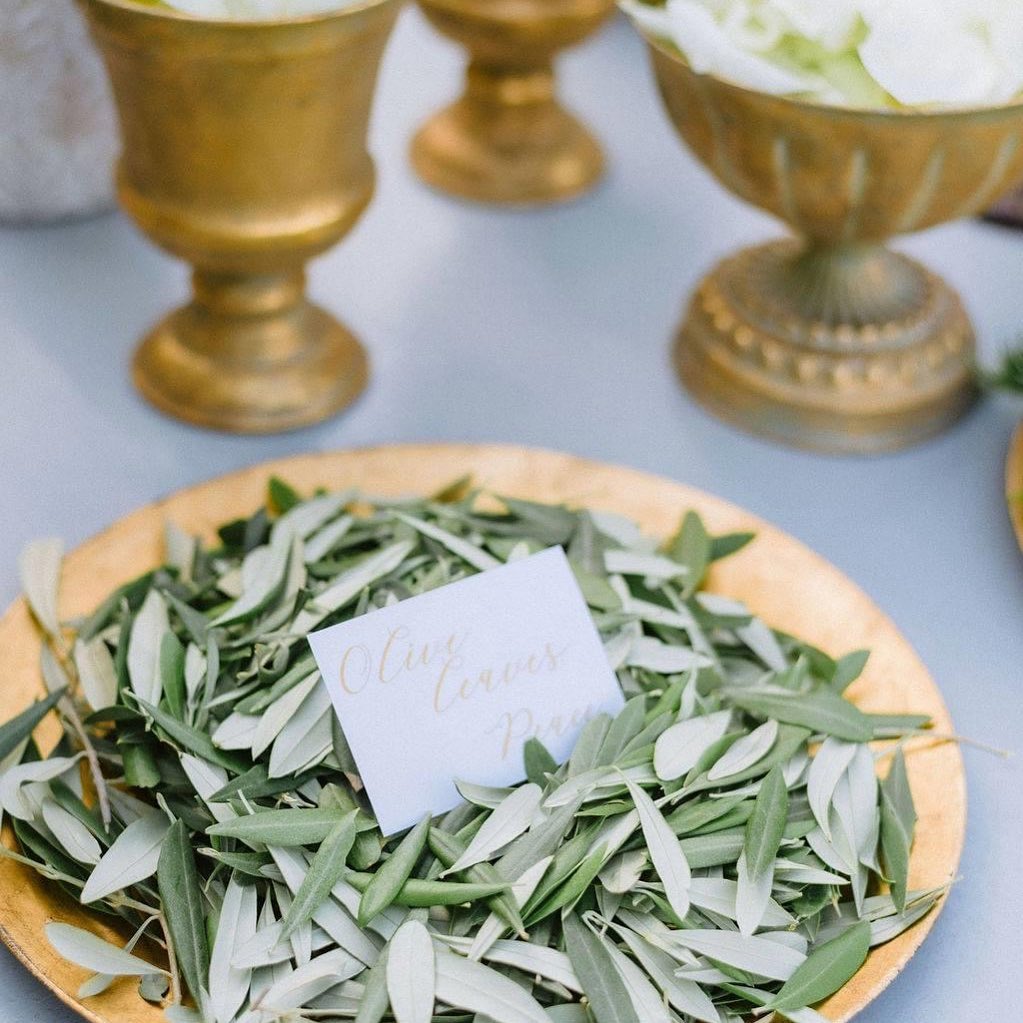 olive leaves and gold bowl wedding decoration ideas